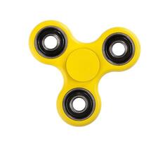 Yellow Fidget Spinner on white background photo