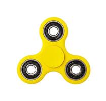 Yellow Fidget Spinner on white background photo