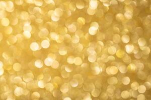 Glittering golden bokeh abstract background photo