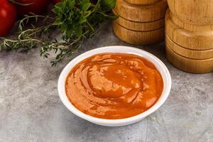 Tasty burger sauce in the bowl photo