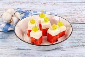Watermelon with feta and grape photo