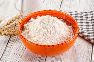 Wheat flour heap for bake photo