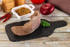 Steamed pork tongue with mustard photo