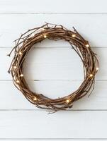Rustic twig wreath with warm lights photo