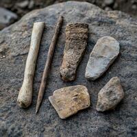 Assortment of ancient stone tools and artifacts photo