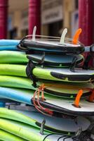 Surf boards in a stack photo
