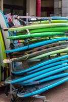 Surf boards in a stack photo