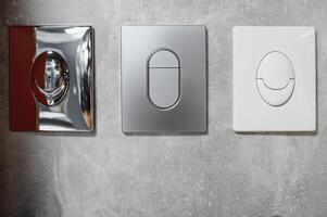 White toilet drain panel and buttons. Toilet installation system in a hardware store photo