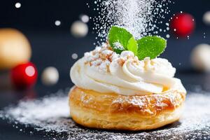 Fluffy cream puff pastry topped with whipped cream and powdered sugar on a dark background photo