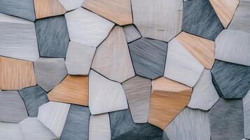 Textured stacked stone tiles in gray and brown arranged in a geometric pattern for modern design photo