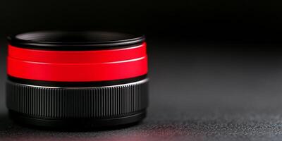 Close-up view of a macro lens featuring a bold red filter emphasizing intricate details photo