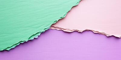 Textured paper background in soft shades of green and pink for creative projects and presentations photo