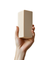 A hand grips a yoga block in preparation for a mindful practice png