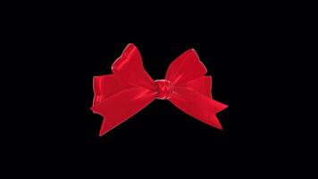 Ribbon Bow Rotating on a Transparent Background. Seamless Loop. Red Ribbon Bow. 4K video