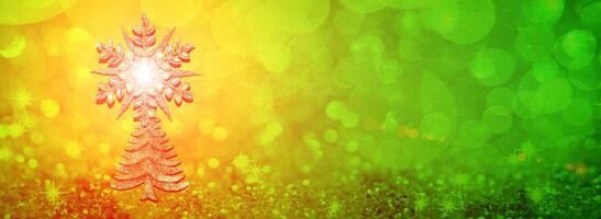Christmas ecological tree, Christmas tree with a sparkling star against the background of yellow and green festive bokeh photo