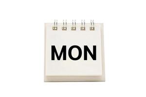 MON text on desk calendar with clipping path isolated on white background. MONDAY and Calendar concept photo