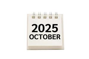 2025 OCT text on desk calendar with clipping path isolated on white background. 2025 October and Calendar concept. photo