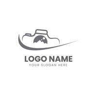 A camera logo design with a mountain in the background vector