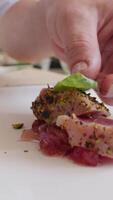 Chef Plates Fresh Tuna Fish Into A Rectangular Serving Dish video