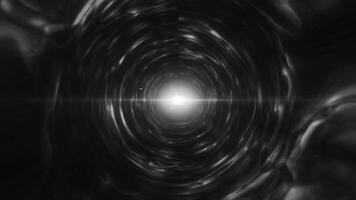 Monochrome tunnel effect with a bright light at the center, creating a surreal, sci-fi-inspired digital design in black and white background video