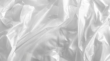 This closeup of crumpled, transparent plastic showcases its unique texture, ideal for design, packaging, and sustainable recycling, benefiting the environment and fostering creativity photo