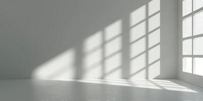 A spacious and bright room filled with shadows gracefully cast by window frames, ideal for minimalist design themes photo