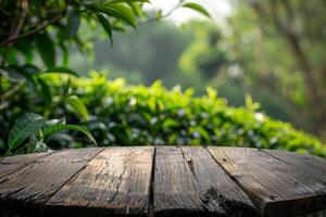 A rustic wooden table in a serene garden, perfect for outdoor gatherings and nature-inspired settings. photo