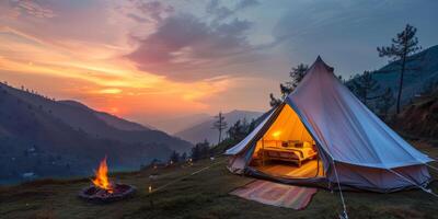 Imagine a cozy glamping setup with a tent and warm campfire, set against a stunning sunset backdrop photo
