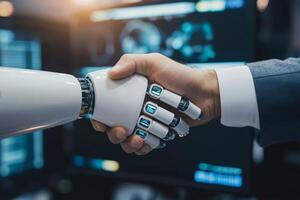 The synergy between AI and human abilities is like a handshake, symbolizing trust and collaboration vital for success in business and technology, fostering partnerships and innovations photo