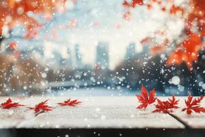 A serene autumn scene unfolds with frozen maple leaves on a rustic wooden table dusted with snow, showcasing the enchanting transition from vibrant fall colors to peaceful winter chill photo