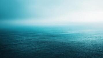 A calming abstract illustration featuring vibrant turquoise ocean waves with textured effects, blending gradient shades of blue and green in a minimalist design that evokes tranquility photo