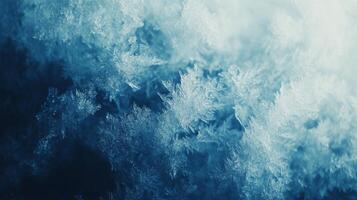 A stunning closeup image of frost crystals beautifully displayed on a cold surface, highlighting their intricate patterns and featuring a serene blue color palette that evokes the essence of winter photo