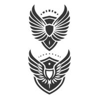Two black and white wings on a shield vector