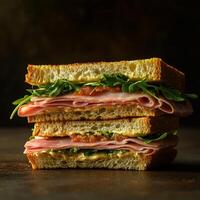 Delicious Ham and Arugula Sandwich with Fresh Tomato and Mustard Spread photo