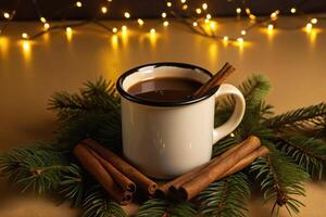 Cup of hot chocolate with cinnamon sticks and christmas lights photo