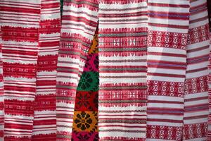 Slavic embroidered towels with ethnic patterns. National Belarusian or Ukrainian pattern on fabric. photo
