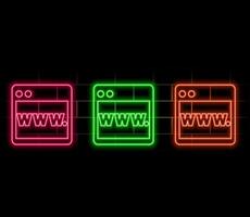 Laptop or notebook computer icon. Colour neon style on dark brick wall background. Light icon. vector