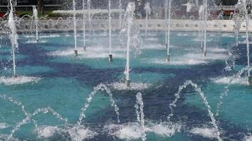 A captivating and dynamic water fountain display featuring a variety of colorful patterns video