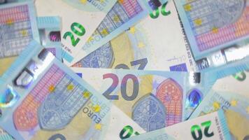 20 Euro Bills, Rotating Money Background - Top View. Euro Money Currency. Blue Paper Money. A Lot of Twenty Euro Banknotes. Business, Finances, Cash and Money Saving Concept - Rotation Right video