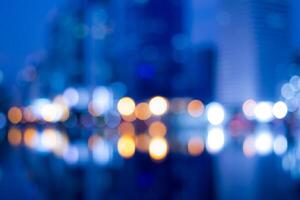 Abstract bokeh night in city background, cityscape at twilight time blurred photo