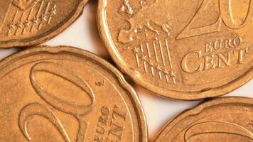 20 Euro Cent Coins, Rotating Money Background - Top View, Macro. Euro Money Currency. A Lot of Twenty Cent Cash. Golden Eurocents. Business, Finances and Money Saving Concept - Slow Rotation Left video
