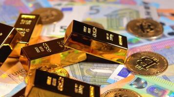 Fine Gold Bars with Bitcoin Coins on the Different Euro Banknotes Rotating. Euro Currency. Colored Paper Money. A Lot of Euro Cash. Income, Earnings, Cryptocurrency, Money Saving and Wealth Concept video
