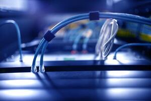 A close up of a network cable in a server room photo