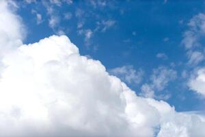 A large white cloud is in the sky photo