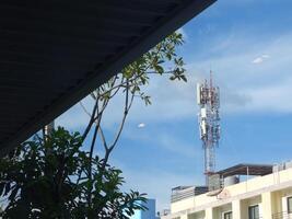 A building with a cell phone tower photo