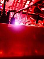 A red light is shining on a computer photo
