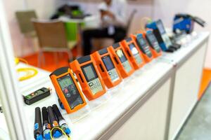 A display of electronic devices on a table photo