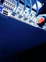 A close up of a computer with multiple wires photo