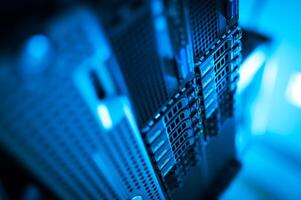 A close up of a computer server with blue lights photo