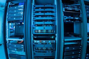 A rack of servers in a data center photo